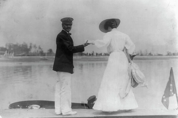 Man assisting woman into boat, Oyster Bay, Long Island, N.Y. 1905. Creator: Frances Benjamin Johnston