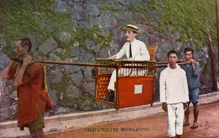 Framed Print : Man being carried on a Sedan chair, Hong kong, 20th century Framed Print : Man being carried on a Sedan chair, Hong kong, 20th century