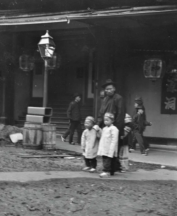 Framed Print : Man and two children crossing a street, Chinatown, San Francisco, between 1896 and 1906. Creator: Arnold Genthe Framed Print : Man and two children crossing a street, Chinatown, San Francisco, between 1896 and 1906. Creator: Arnold Genthe