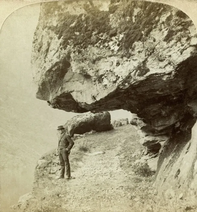 Framed Print : Man on a cliff overlooking Naeroyfjord, Sogne, Norway. Artist: Bert Underwood Framed Print : Man on a cliff overlooking Naeroyfjord, Sogne, Norway. Artist: Bert Underwood
