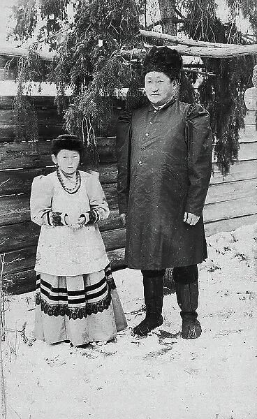 A man with his daughter, late 19th cent - early 20th cent. Creator: I Popov