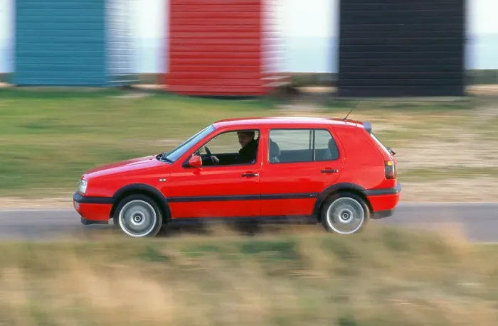 Framed Print : Man driving 1996 Vokswagen Golf Gti Framed Print : Man driving 1996 Vokswagen Golf Gti
