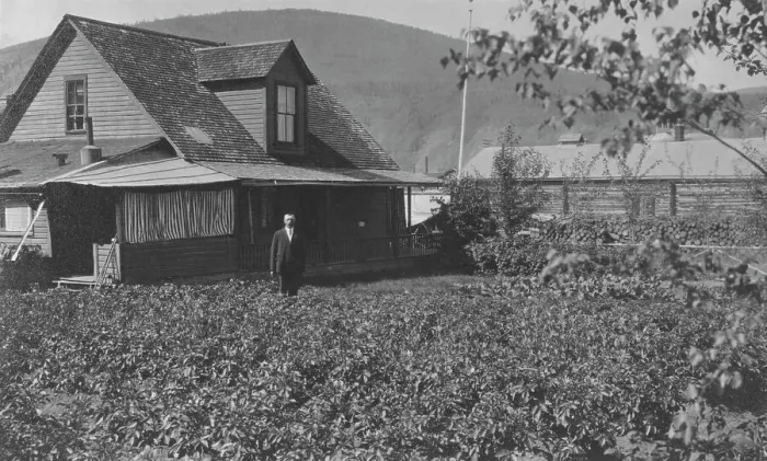 Framed Print : Man in frontyard of house, between c1900 and 1916. Creator: Unknown Framed Print : Man in frontyard of house, between c1900 and 1916. Creator: Unknown