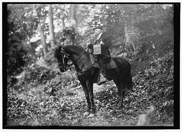 Man on horse in woods, between 1914 and 1917. Creator: Harris & Ewing. Man on horse in woods, between 1914 and 1917. Creator: Harris & Ewing