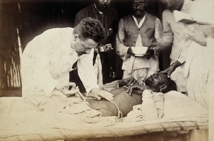 Framed Print : Man being injected by doctor, during the outbreak of bubonic plague in Karachi, India, 1897. Creator: Unknown Framed Print : Man being injected by doctor, during the outbreak of bubonic plague in Karachi, India, 1897. Creator: Unknown