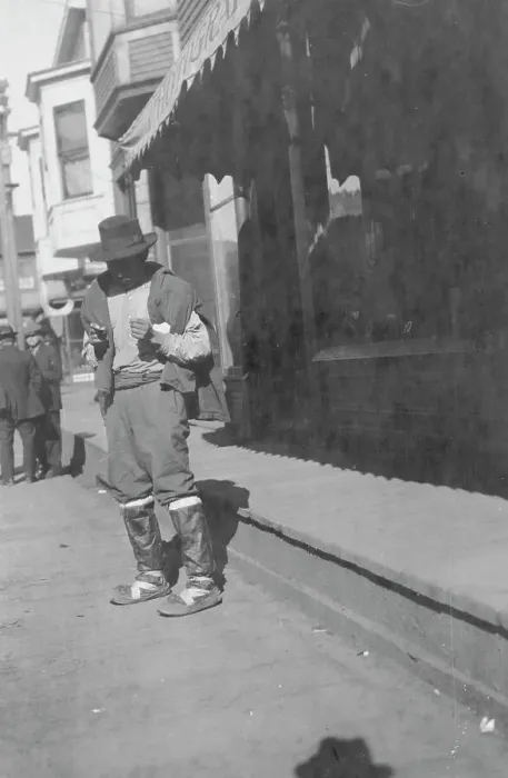 Framed Print : Man outside store, between c1900 and 1916. Creator: Unknown Framed Print : Man outside store, between c1900 and 1916. Creator: Unknown