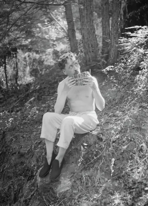 Framed Print : Man playing panpipes in the woods, between 1911 and 1942. Creator: Arnold Genthe Framed Print : Man playing panpipes in the woods, between 1911 and 1942. Creator: Arnold Genthe
