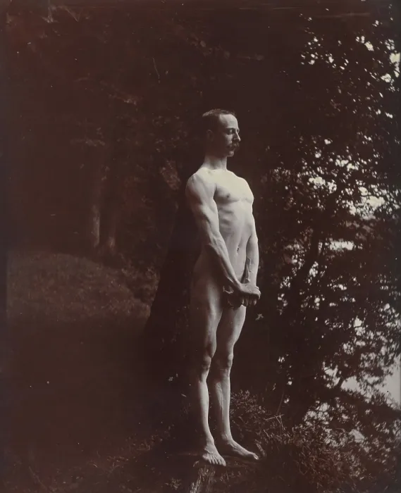 Framed Print : A man posing naked, standing with his chest out, arms down and hands clasped, approx 1900. Creator: Unknown Framed Print : A man posing naked, standing with his chest out, arms down and hands clasped, approx 1900. Creator: Unknown
