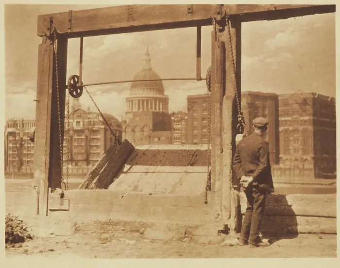 Framed Print : [Man on riverbank]. From the album: Photograph album - London, 1920s. Creator: Harry Moult