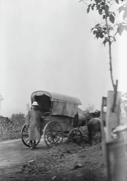 Man standing behind a horse-drawn wagon, Japan, 1908. Creator: Arnold Genthe
