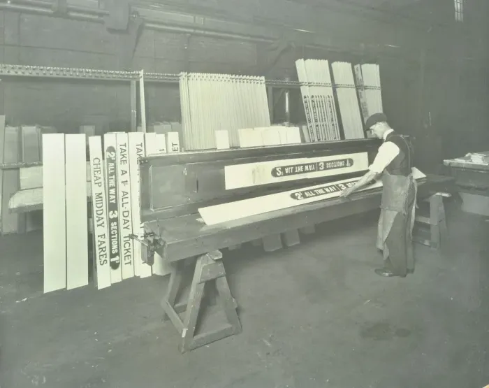 Framed Print : Man stencilling signs for tram cars at Charlton Central Repair Depot, London, 1932 Framed Print : Man stencilling signs for tram cars at Charlton Central Repair Depot, London, 1932