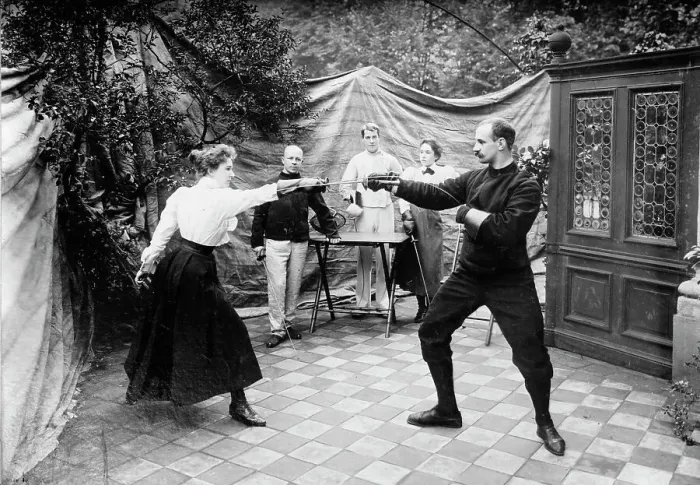Framed Print : Man and woman fencing (?), between c1910 and c1915. Creator: Bain News Service Framed Print : Man and woman fencing (?), between c1910 and c1915. Creator: Bain News Service
