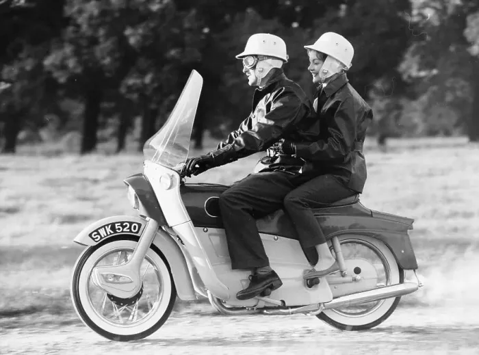 Framed Print : A man and a woman riding an Ariel Leader, 1958 Framed Print : A man and a woman riding an Ariel Leader, 1958