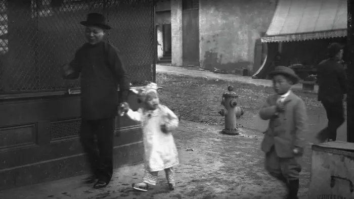 Framed Print : Man and a young child walking down a street, Chinatown, San Francisco, between 1896 and 1906. Creator: Arnold Genthe Framed Print : Man and a young child walking down a street, Chinatown, San Francisco, between 1896 and 1906. Creator: Arnold Genthe