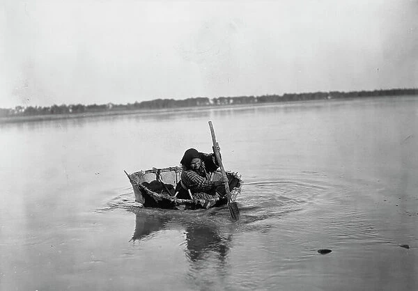 Mandan bull boat, c1908. Creator: Edward Sheriff Curtis