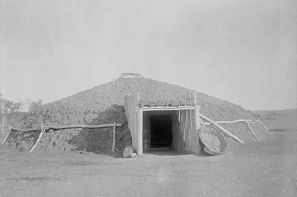 Mandan earthen lodge, c1908. Creator: Edward Sheriff Curtis