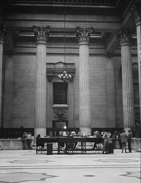 Marble hall of the Custom House, New Orleans, between 1920 and 1926. Creator: Arnold Genthe