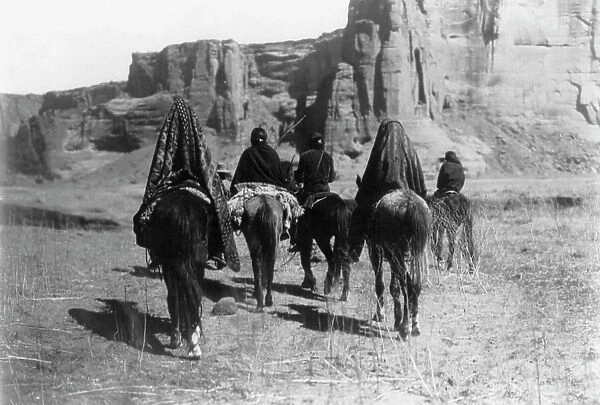 March through Tesacod Canyon, c1905. Creator: Edward Sheriff Curtis