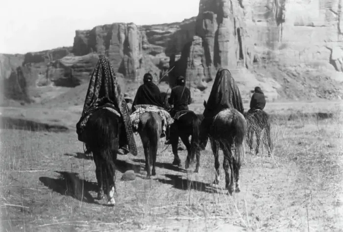 Framed Print : March through Tesacod Canyon, c1905. Creator: Edward Sheriff Curtis Framed Print : March through Tesacod Canyon, c1905. Creator: Edward Sheriff Curtis