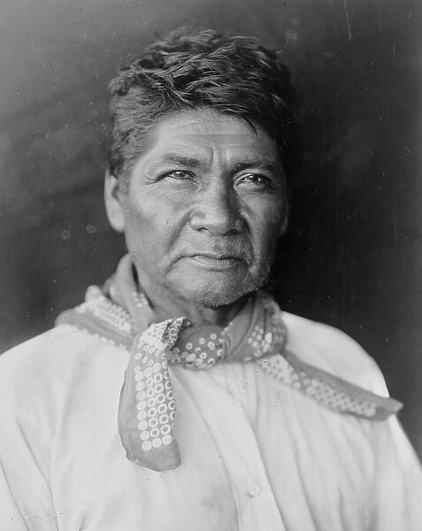 Marcos, Palm Cañon Cahuilla, half-length portrait, facing slightly right, c1905 [c1924]. Creator: Edward Sheriff Curtis