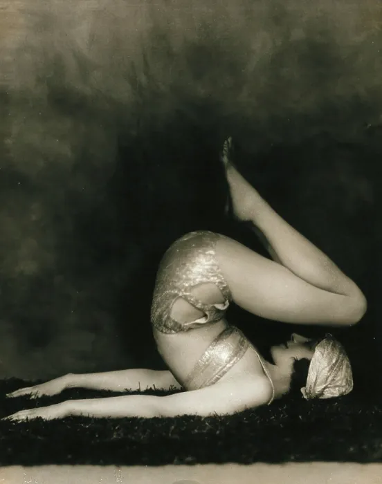 Framed Print : Marguerite Agniel posing with her back arched and feet in the air, wearing a two-piece cos... 1929. Creator: Unknown Framed Print : Marguerite Agniel posing with her back arched and feet in the air, wearing a two-piece cos... 1929. Creator: Unknown