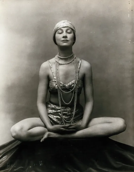 Framed Print : Marguerite Agniel posing with her legs crossed and hands together resting on her legs, 1929. Creator: Unknown