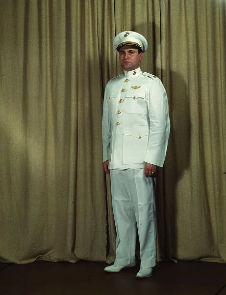 Marine Corps Major in dress white uniform, World War II, between 1941 and 1945. Creator: Howard Hollem