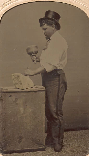 Mason in Top Hat with Mallet, Chisel, and Piece of Stone, 1870s-80s. Creator: J. R