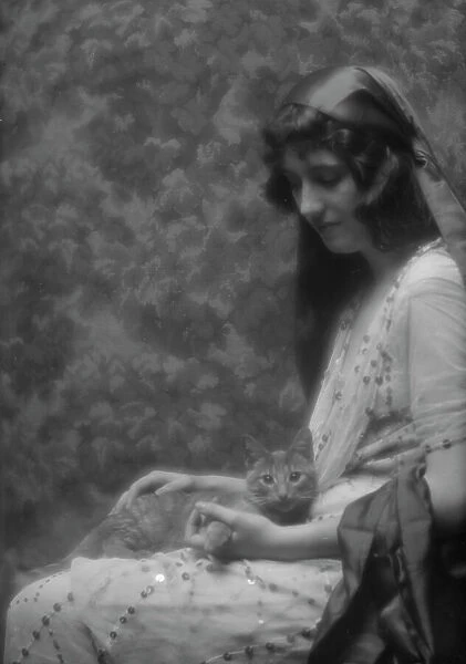 Maude, Bonnie, Miss, with Buzzer the cat, portrait photograph, between 1912 and 1918. Creator: Arnold Genthe