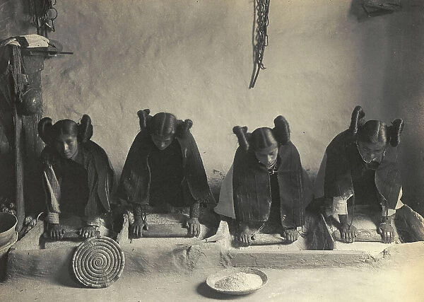 The mealing trough-Hopi, c1906. Creator: Edward Sheriff Curtis
