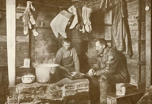 Meares and Demetri at the Blubber Stove in the Discovery Hut, 3 November 1911, (1913)