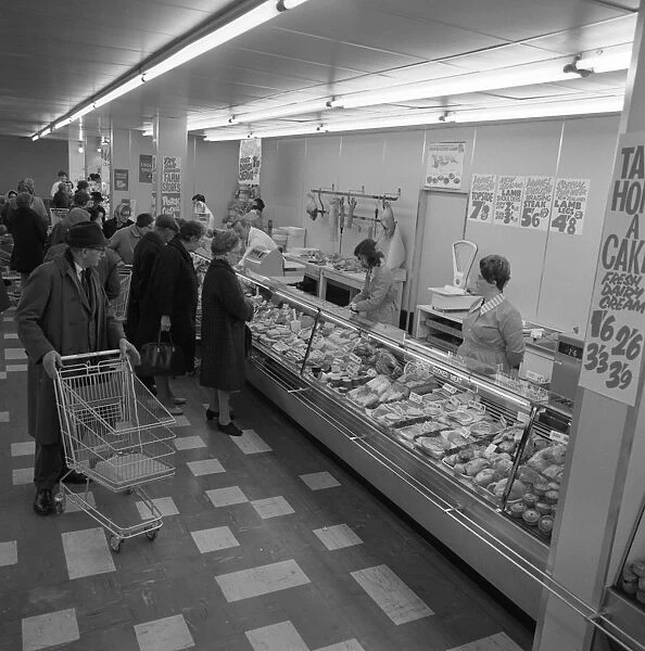 The meat counter at the ASDA supermarket in Rotherham, South Yorkshire, 1969. Artist