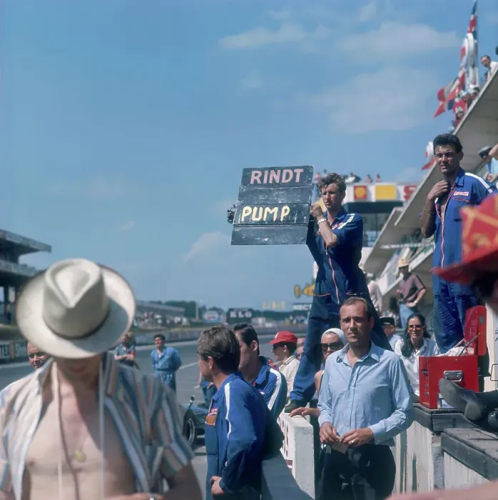 Framed Print : A mechanic holding up a sign, French Grand Prix, Le Mans, France, 1967 Framed Print : A mechanic holding up a sign, French Grand Prix, Le Mans, France, 1967