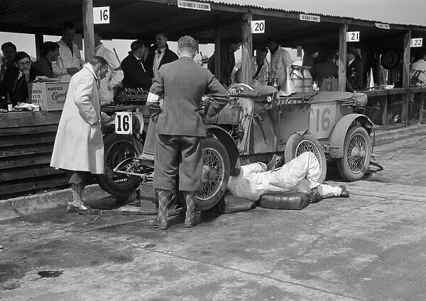 Mechanic working on a Lea Francis J type at the JCC Double Twelve race, Brooklands, May 1931