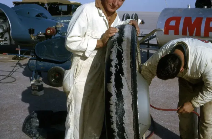 Framed Print : Mechanics inflating Bluebird CN7 tyre for World Land Speed Record attempt, Lake Eyre