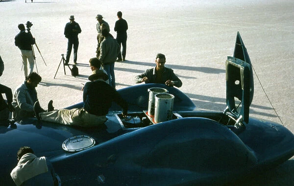 Mechanics working on Bluebird CN7 at lake Eyre for World Land speed record attempt, 1964