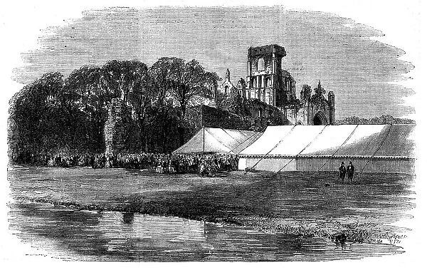 Meeting of the British Association at Leeds - the Horticultural Fete at Kirkstall Abbey, 1858. Creator: Unknown