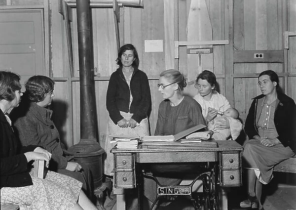 Meeting of the Mothers Club in Arvin camp for migrant workers, Kern County, 1938. Creator: Dorothea Lange