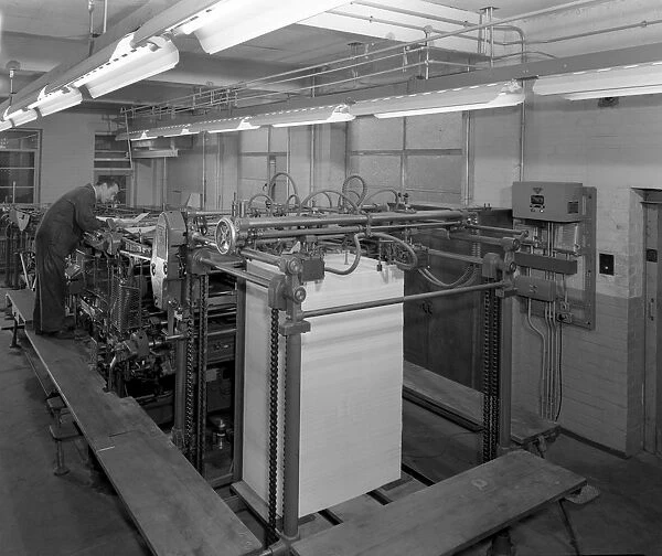 Meilhe two colour printing machine in operation at a printers, Mexborough, South Yorkshire, 1959