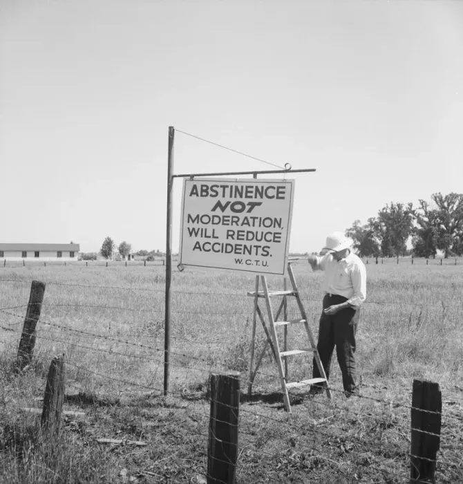 Framed Print : Member of the committee... erects sign on U.S. 99 highway, near Hanford, California, 1939. Creator: Dorothea Lange Framed Print : Member of the committee... erects sign on U.S. 99 highway, near Hanford, California, 1939. Creator: Dorothea Lange