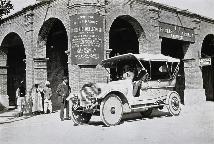 Framed Print : Two men in a car outside the Wellcome pharmaceutical depot in the Middle East, c1900s. Creator: Unknown Framed Print : Two men in a car outside the Wellcome pharmaceutical depot in the Middle East, c1900s. Creator: Unknown