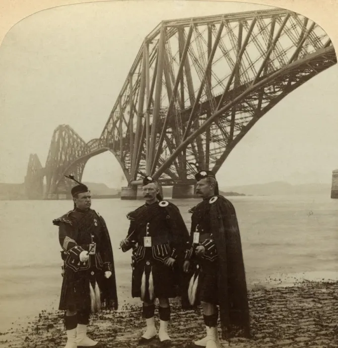 Framed Print : Men in Highland dress in front of the Forth Bridge, Scotland. Artist: Underwood & Underwood Framed Print : Men in Highland dress in front of the Forth Bridge, Scotland. Artist: Underwood & Underwood