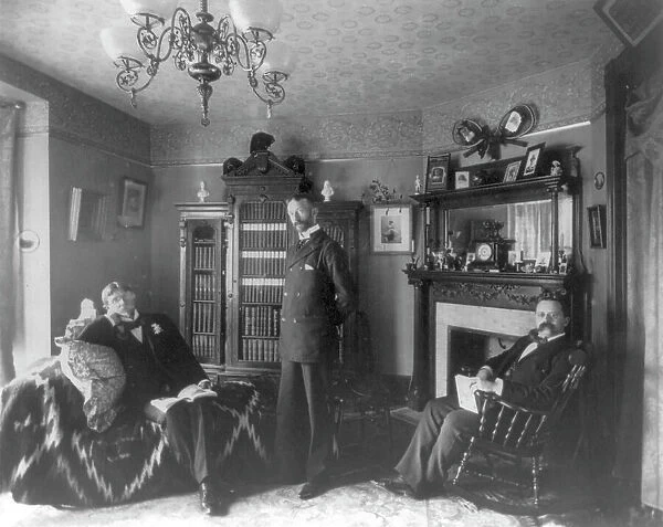 Three men in an interior, between c1890 and c1910. Creator: Frances Benjamin Johnston