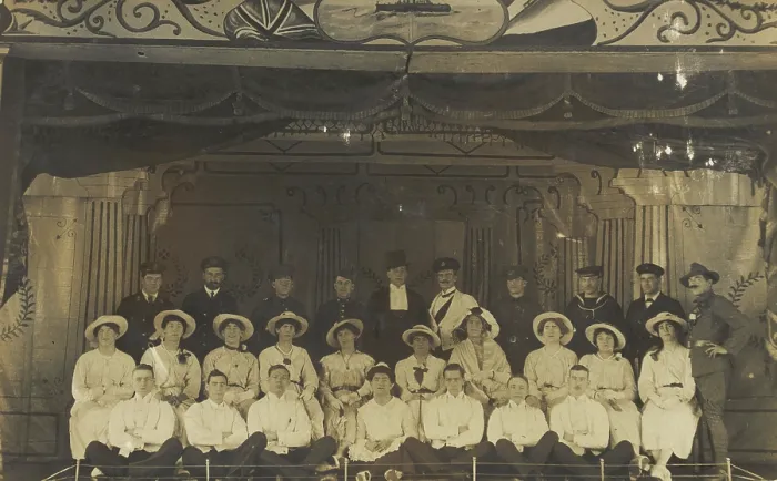 Framed Print : Men on a large stage set, [between 1910 and 1919 and between 1920 and 1929?]. Creator: Unknown