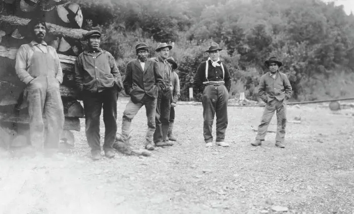 Framed Print : Men next to logs, between c1900 and 1916. Creator: Unknown Framed Print : Men next to logs, between c1900 and 1916. Creator: Unknown