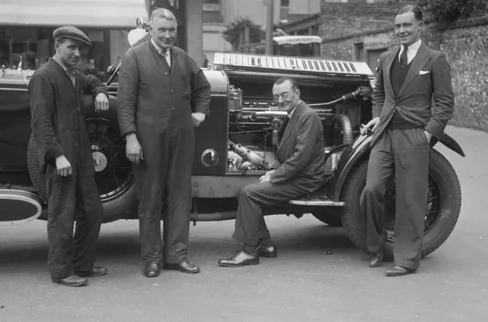 Framed Print : Four men posing beside a Minerva car. Artist: Bill Brunell