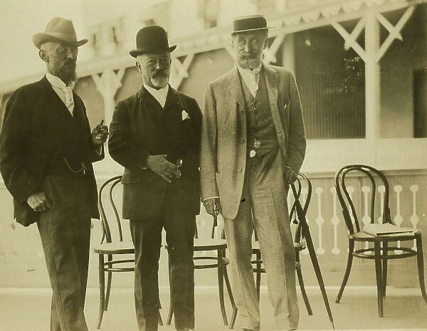 Three men, probably journalists, full-length portrait, facing front, 1905. Creator: Unknown