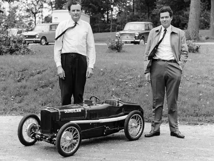 Framed Print : Two men standing by a miniature Sunbeam pedal car, 1960s Framed Print : Two men standing by a miniature Sunbeam pedal car, 1960s