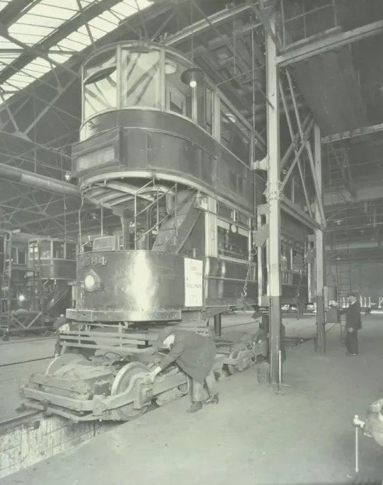 Framed Print : Men using a car lifting hoist at Charlton Central Repair Depot, London, 1932 Framed Print : Men using a car lifting hoist at Charlton Central Repair Depot, London, 1932