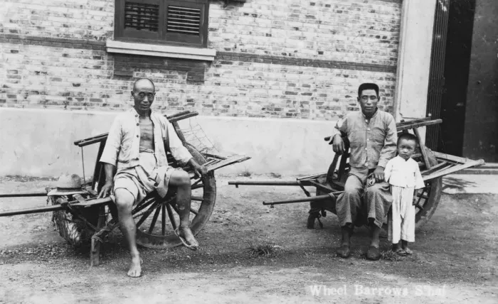 Framed Print : Men with wheelbarrows, Vietnam(?), 20th century Framed Print : Men with wheelbarrows, Vietnam(?), 20th century
